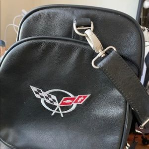Leather corvette duffel bag, belt and baseball hat.  All 3 items